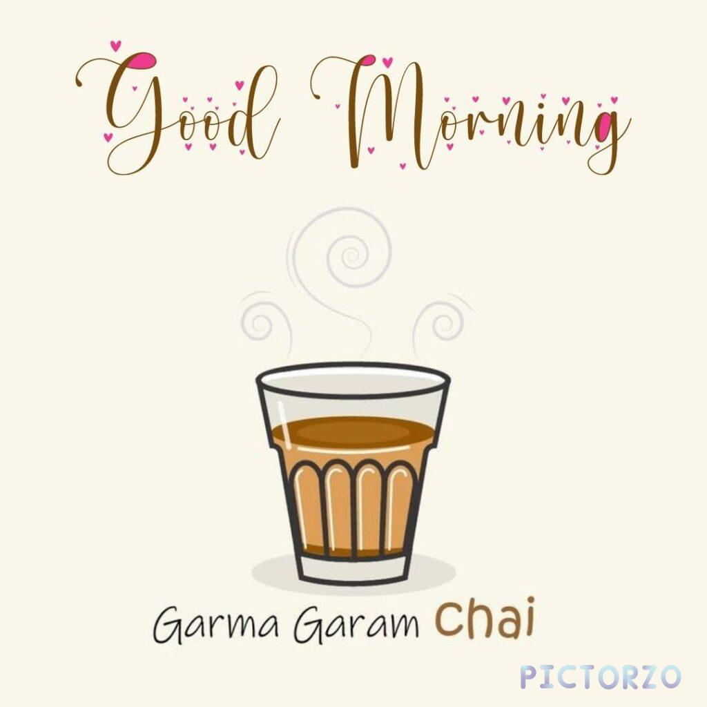 A cup of steaming hot chai tea on a wooden table with the text Good Morning and Garma Garam Chai in Hindi