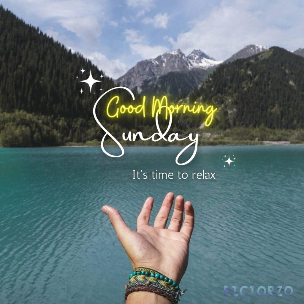 A digital image with the text Good Morning Sunday It's time to relax in a white font on a blue background. The image is intended to convey a sense of peace and relaxation