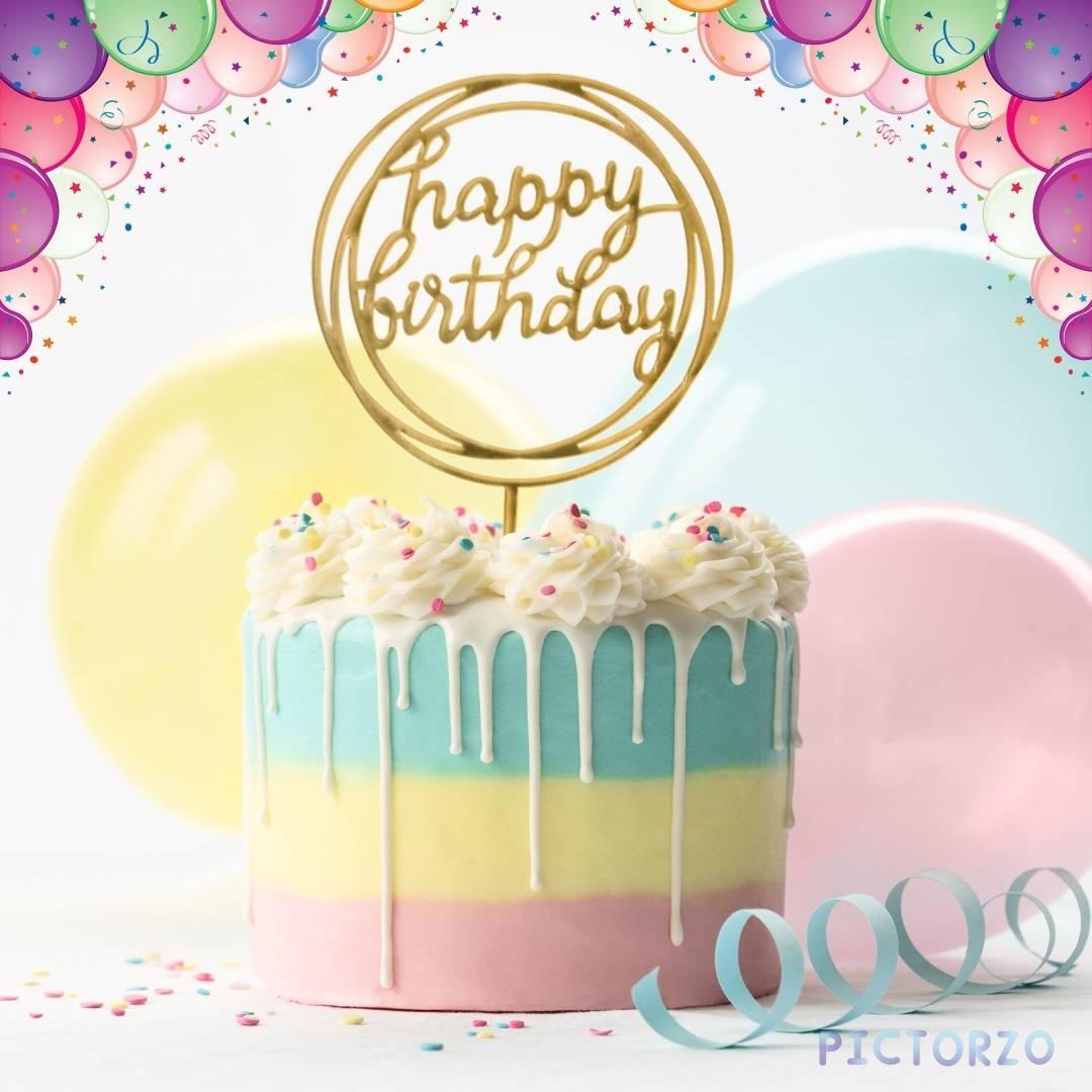 Happy Birthday Cake Images 1 A close-up photo of a round chocolate cake with a golden happy birthday topper and balloons on a white background. The cake is decorated with white frosting, chocolate shavings, and sprinkles