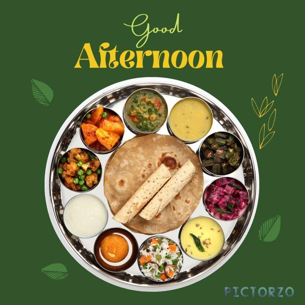 A close-up photo of a round metal tray, or thali, filled with a variety of Indian dishes. The thali is displayed on a green background, and the text "Good Afternoon" is written in the top left corner. The dishes on the thali include rice, dal, vegetables, and meat, as well as a variety of chutneys and condiments.