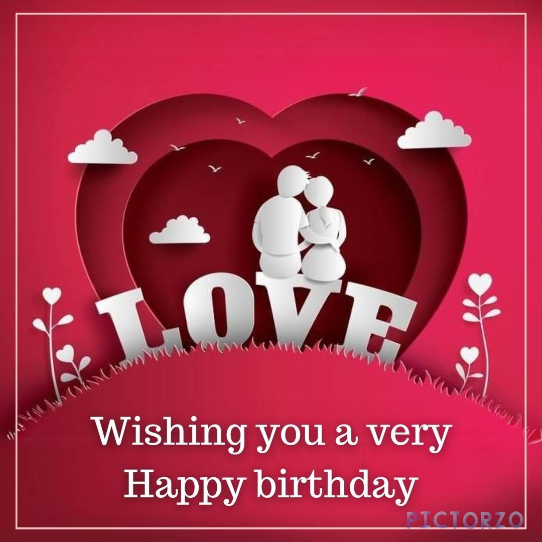 Happy Birthday Love Images 1 A colorful mural depicting a loving couple embracing on a giant love-shaped. The text LOVE is written in white across the top of the heart, and Happy Birthday is written in red below it