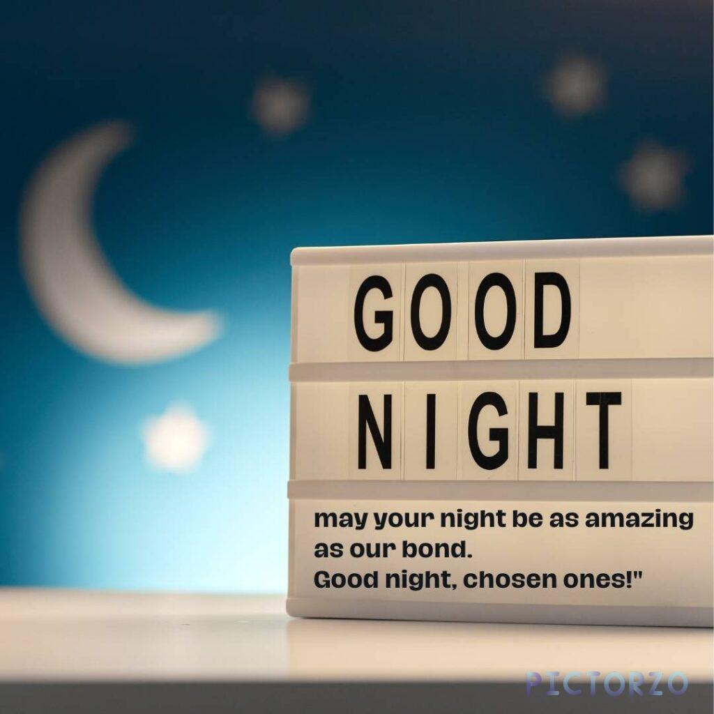 A dark blue sign with white text that says GOOD NIGHT at the top, followed by may your night be as amazing as our bond in smaller letters, and Good night, chosen ones! at the bottom