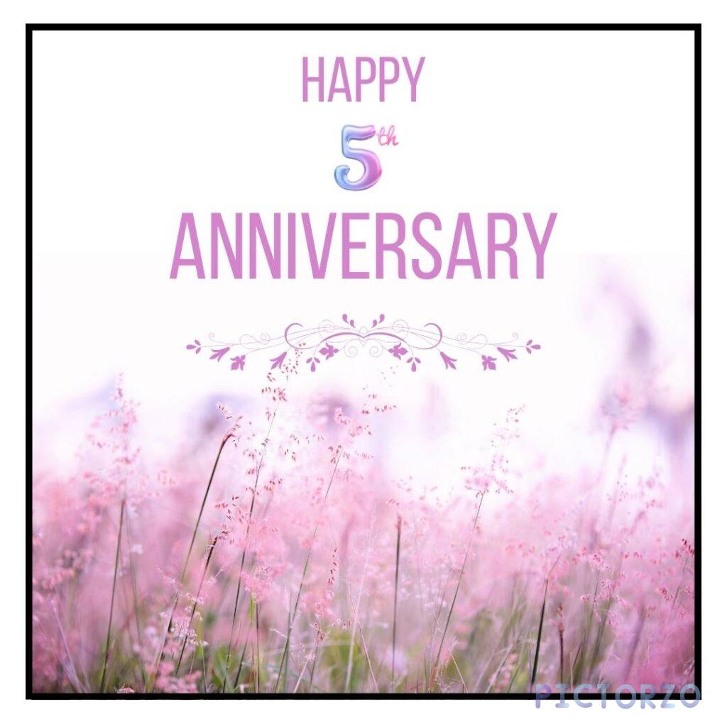 A digital image with the text “Happy 5th Anniversary” in a festive font, berwarna merah (red in Indonesian) colored text on a white background
