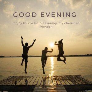 Good Evening Friends Images 17 A group of people standing in silhouette against a sunset, with the text GOOD EVENING superimposed. The text below the image reads Enjoy this beautiful evening, my cherished friends