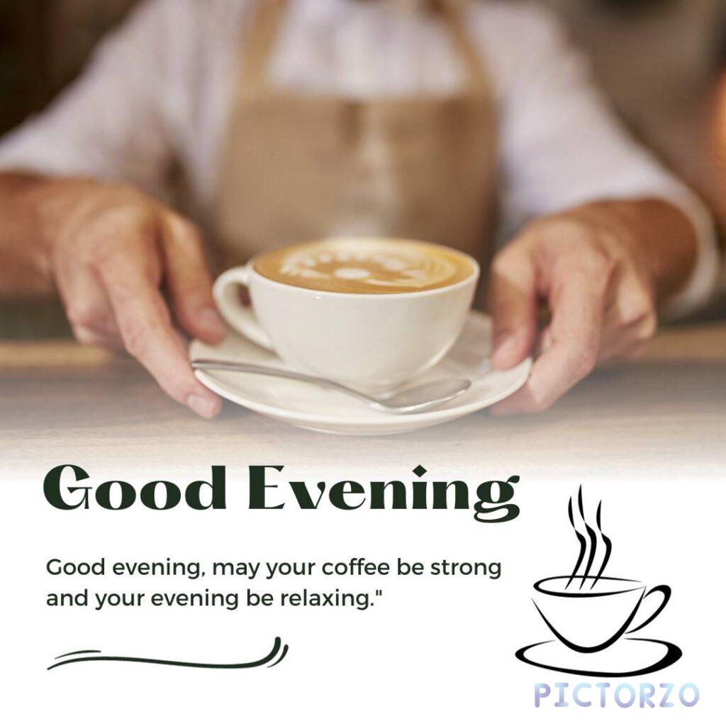 A person holding a white mug of coffee with the text "Good Evening" on it. The mug is sitting on a saucer on a wooden table. The person's hand is wrapped around the mug, and their fingers are caressing the warm ceramic. The coffee in the mug is steaming, and the aroma fills the air.
