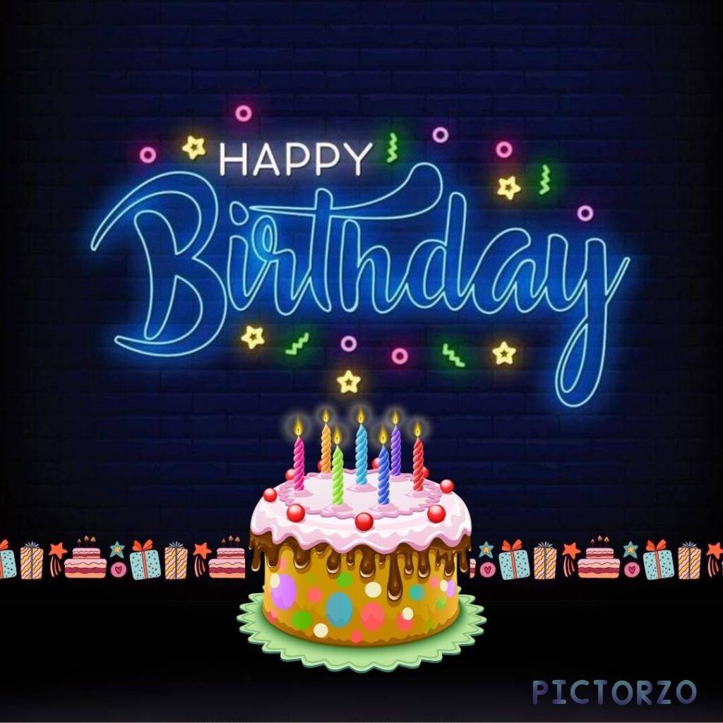 A photo of a birthday cake with neon lights. The cake is round and white with bright pink frosting and sprinkles. The cake has a single lit candle in the center with the words "HAPPY BIRTHDAY" written in frosting above it. The cake is surrounded by neon lights in the shape of stars and hearts.