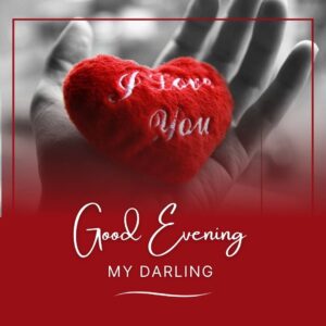 Good Evening Love Images 12 A photo of a hand holding a heart that says Good evening my darling. The background is a bokeh of lights in various colors