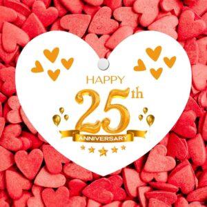 A white heart-shaped plaque with the words Happy 25th Anniversary written in golden lettering and background is so many small red heart.