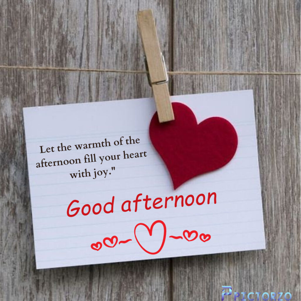 Good afternoon love image. A photo of a heart with the text Let the warmth of the afternoon fill your heart with joy written on it.