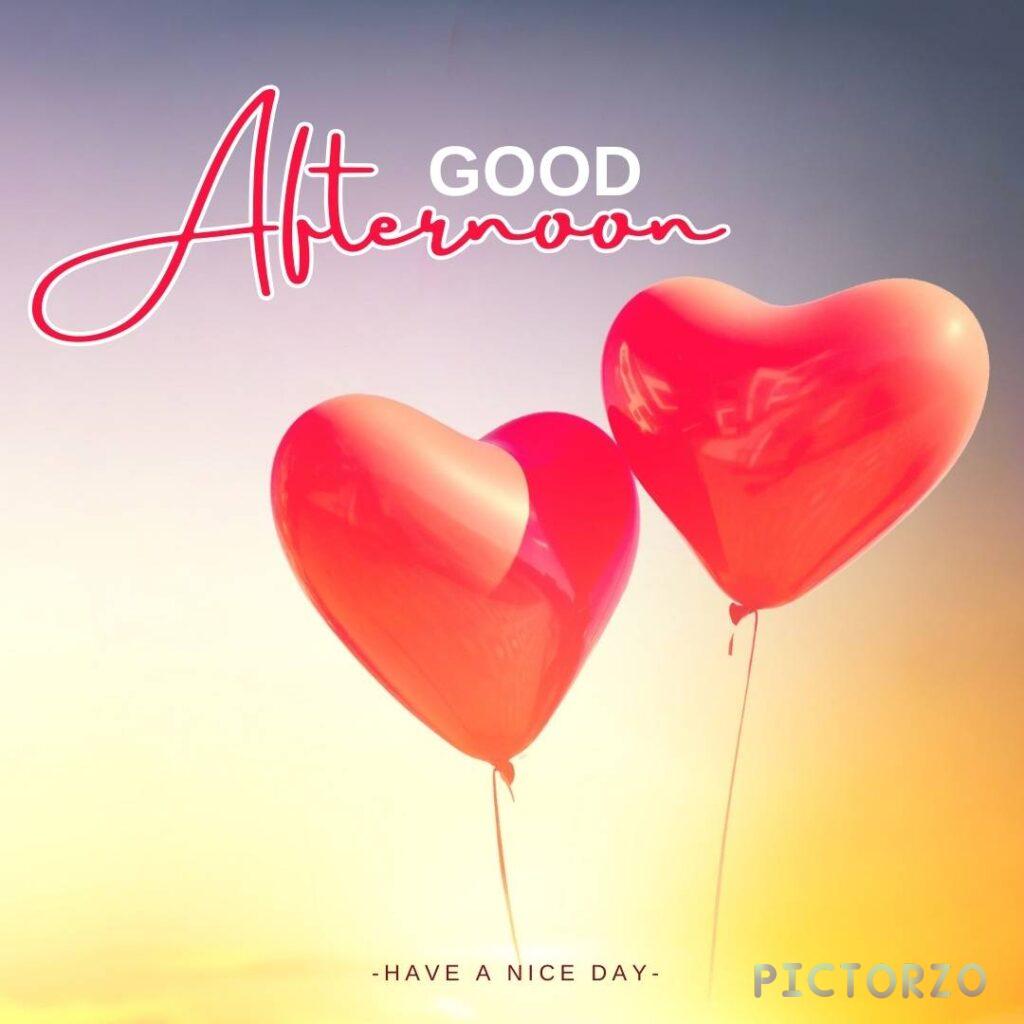 Two red heart-shaped balloons floating in the sky blue background. The text GOOD Afternoon - HAVE A NICE DAY is written in white letters across the balloons.