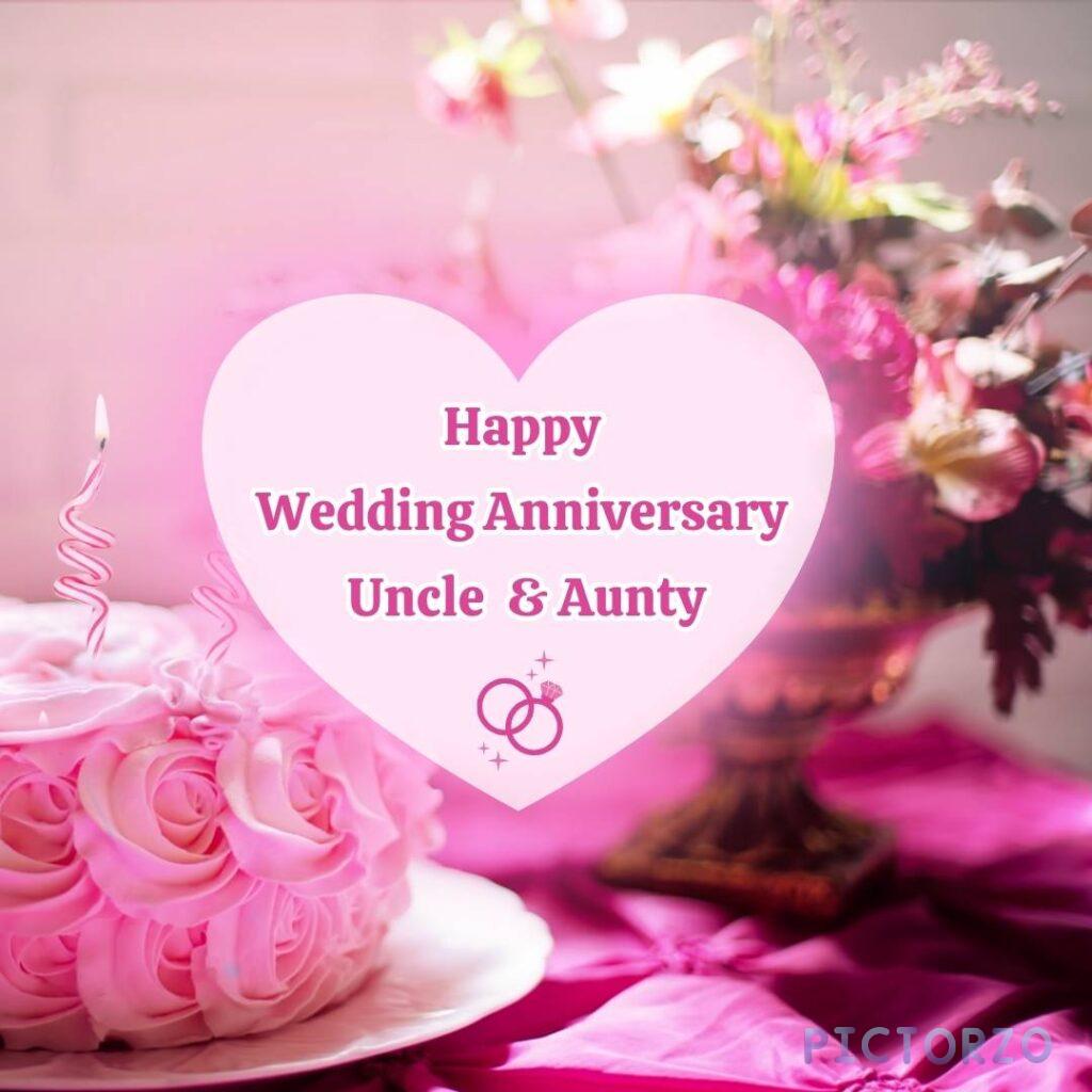 A digital image with red text that reads Happy Wedding Anniversary on top. Below it is a black and white image of a smiling South Asian couple, likely the speaker's aunty and uncle